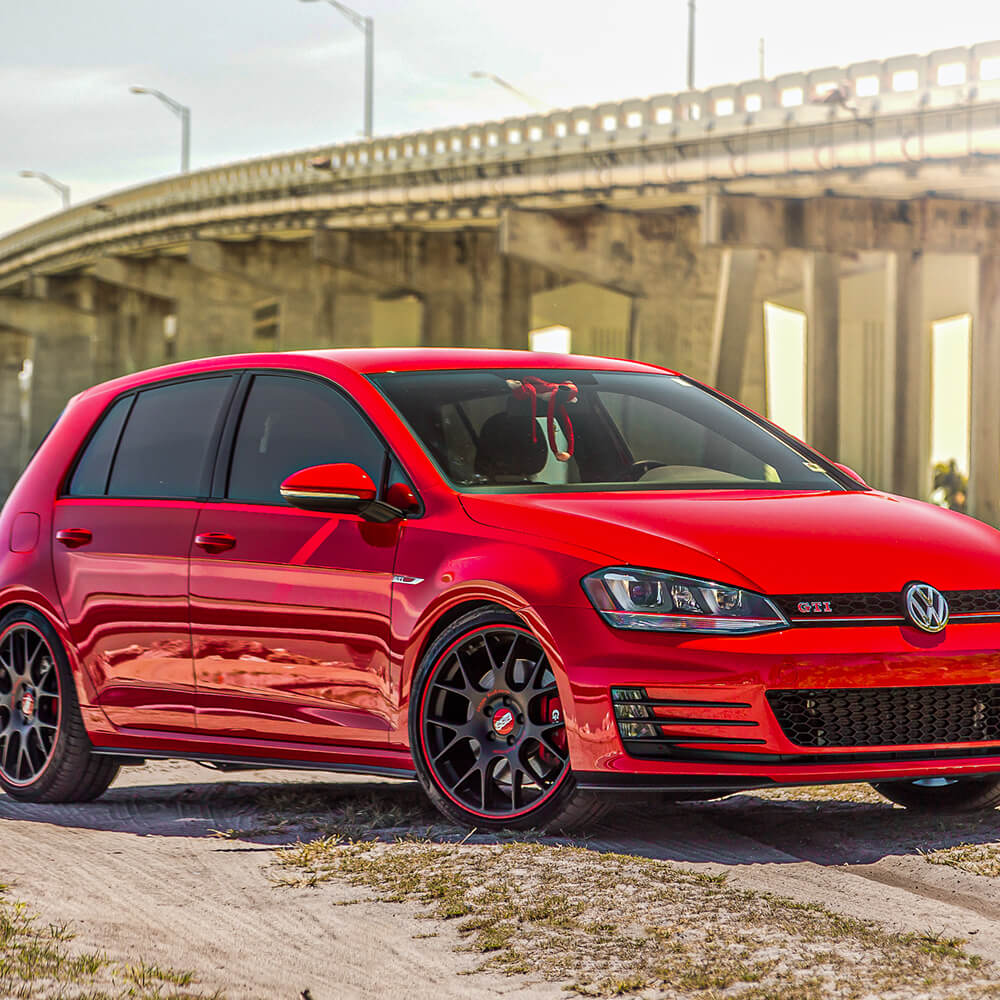 aftermarket wheels for VW Golf gti red car with red car rims